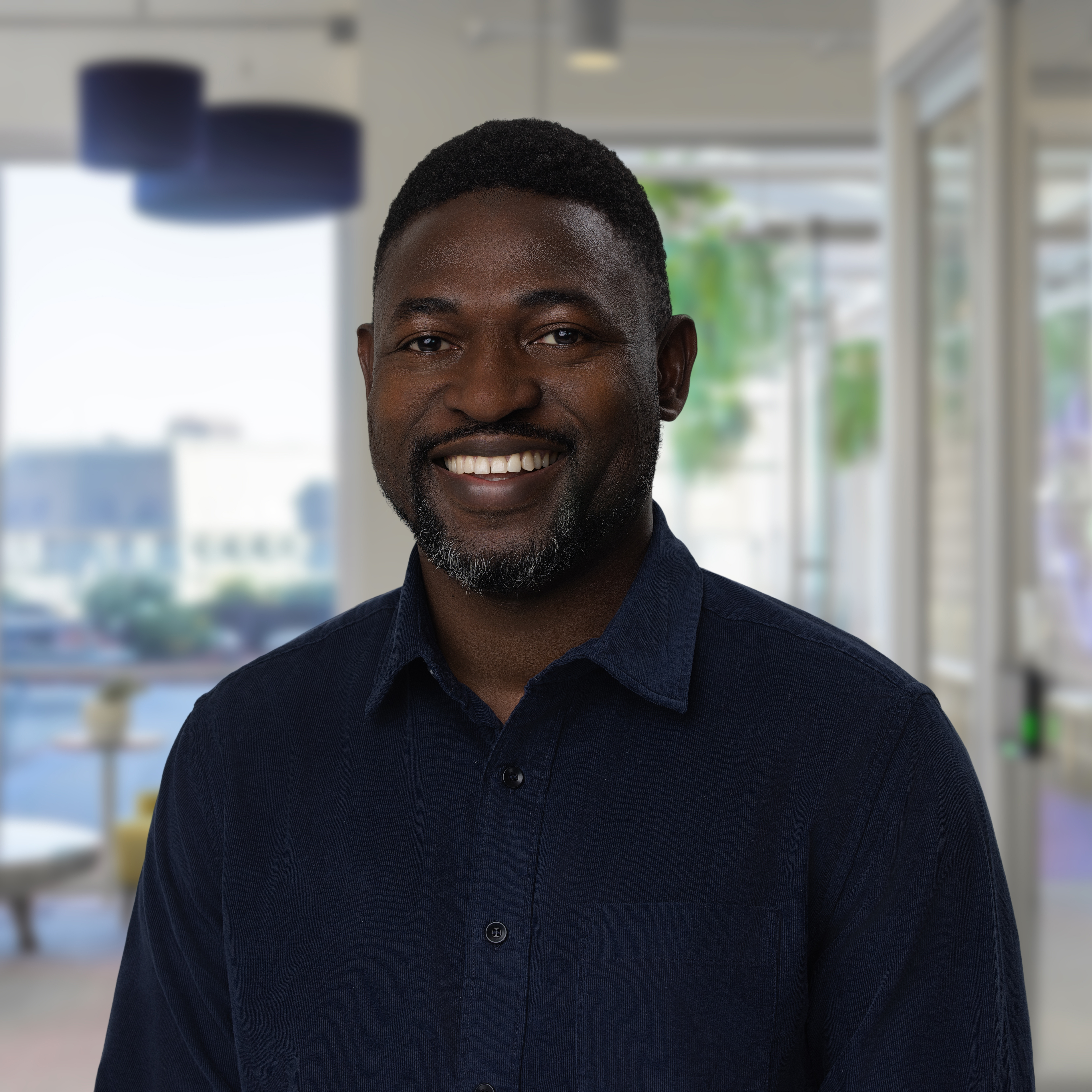 Headshot of Akin Oyedele